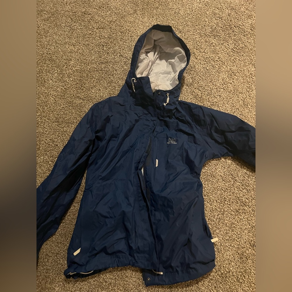Helly Hansen rain jacket. Size small, used but great condition. navy blue